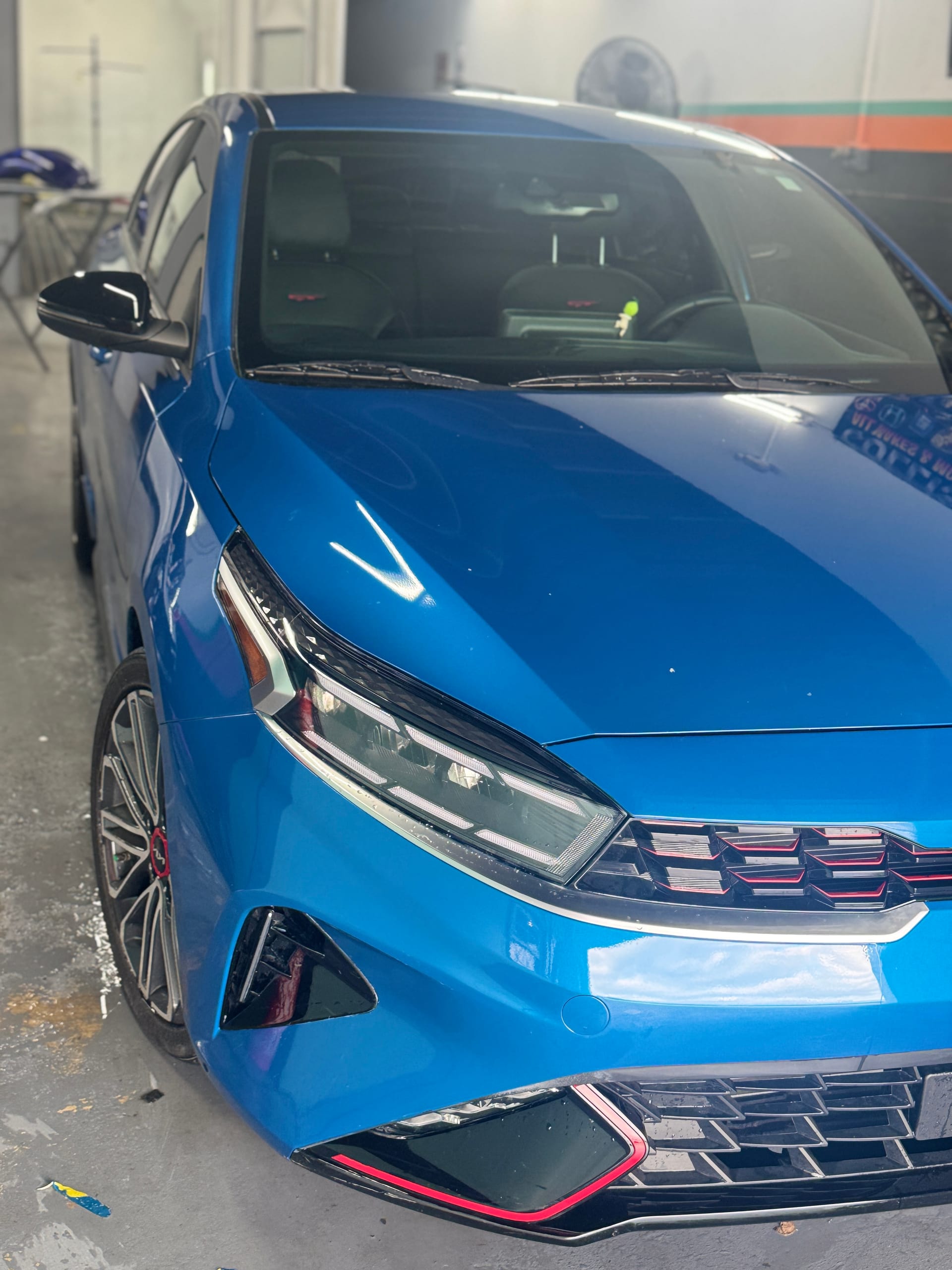The same Kia Forte GT with the front end repaired and refinished
