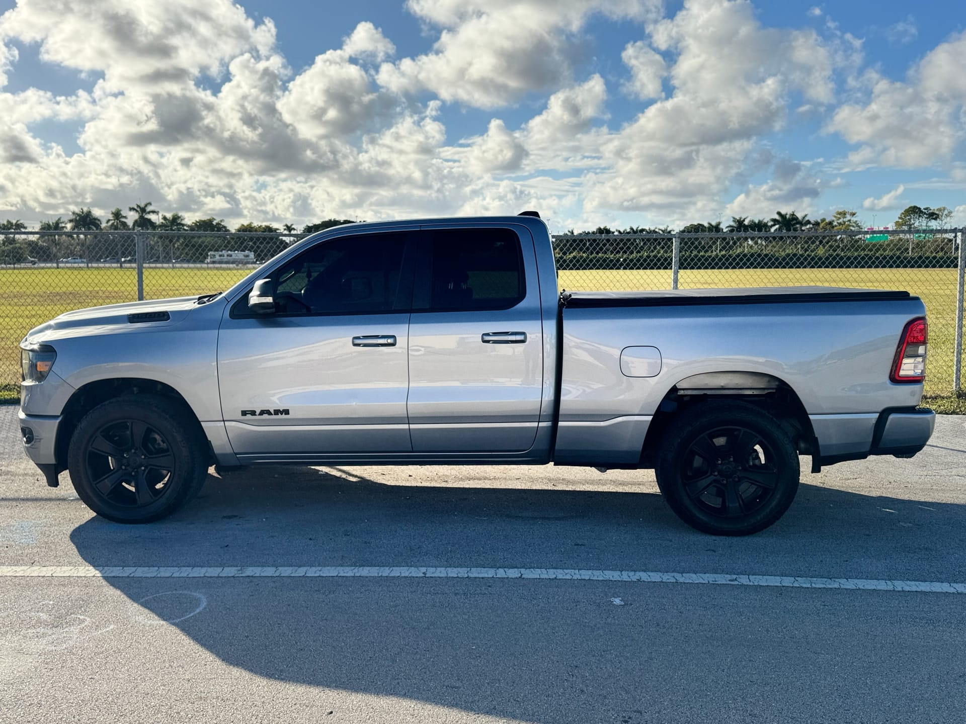 Ram 1500 side profile, finished, outside the shop