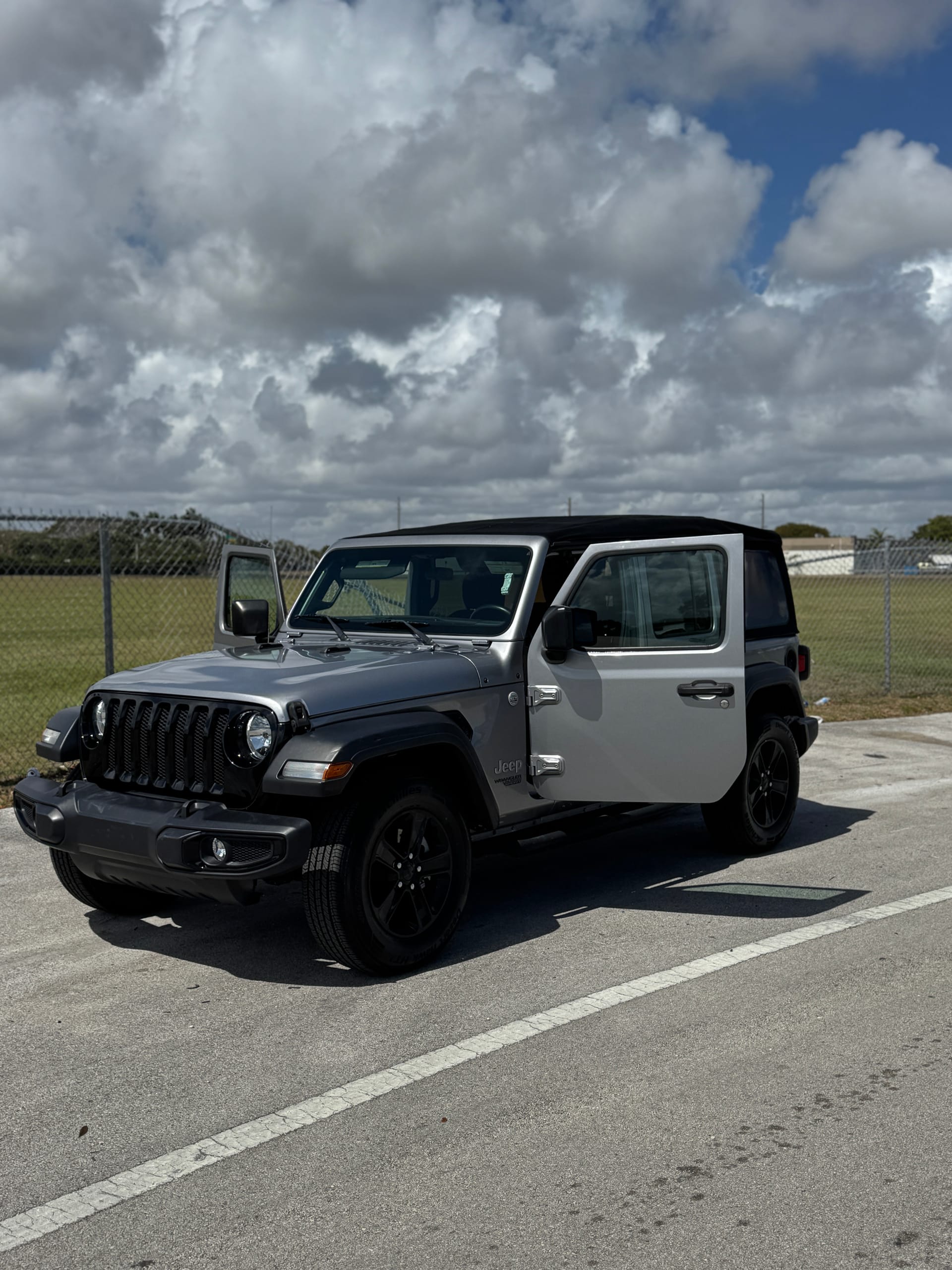 Silver Jeep Wrangler Unlimited, finished, front quarter view